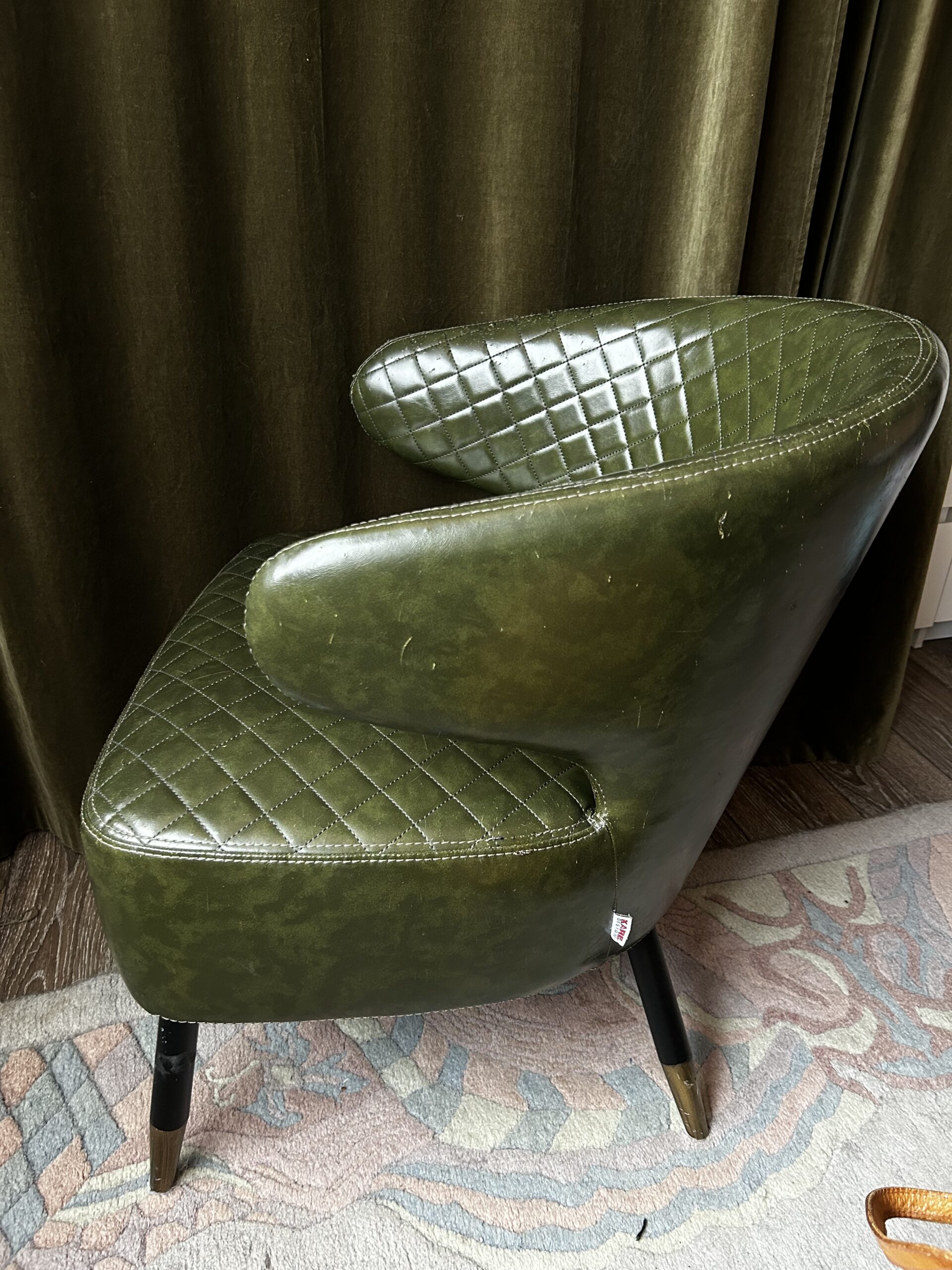 Eleganter Leder Sessel grün mit Steppung